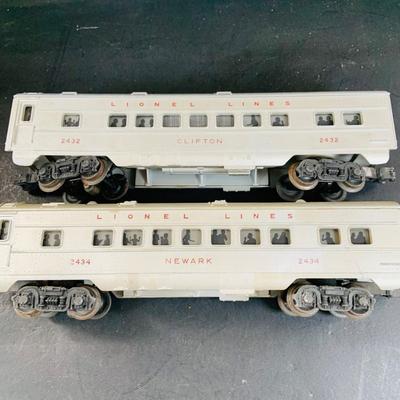 LOT 741: Large Assortment of Lionel and Marx O/24 Gage Lionel Line Passinger Cars and Santa Fe Diesel Engine