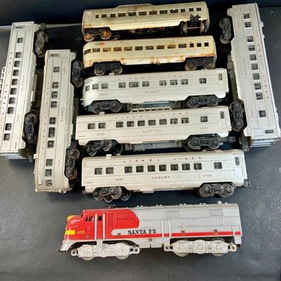 LOT 741: Large Assortment of Lionel and Marx O/24 Gage Lionel Line Passinger Cars and Santa Fe Diesel Engine