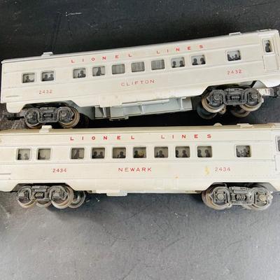 LOT 741: Large Assortment of Lionel and Marx O/24 Gage Lionel Line Passinger Cars and Santa Fe Diesel Engine