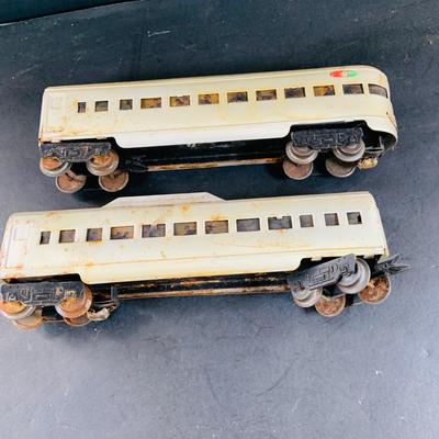 LOT 741: Large Assortment of Lionel and Marx O/24 Gage Lionel Line Passinger Cars and Santa Fe Diesel Engine