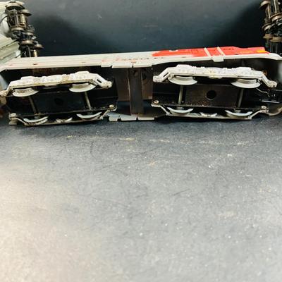 LOT 741: Large Assortment of Lionel and Marx O/24 Gage Lionel Line Passinger Cars and Santa Fe Diesel Engine