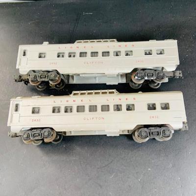LOT 741: Large Assortment of Lionel and Marx O/24 Gage Lionel Line Passinger Cars and Santa Fe Diesel Engine