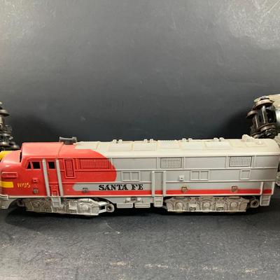 LOT 741: Large Assortment of Lionel and Marx O/24 Gage Lionel Line Passinger Cars and Santa Fe Diesel Engine