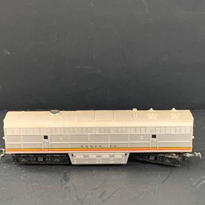 LOT 744: Collection of HO Scale Rail Road Cars and Engines By Tyco and Tempo
