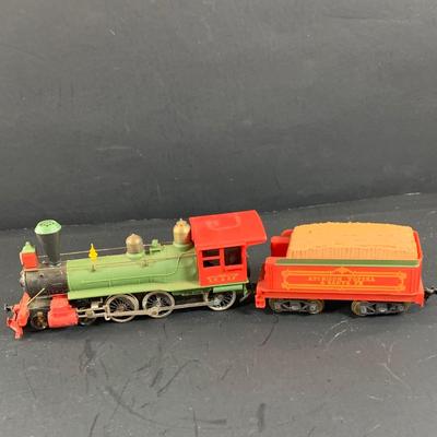 LOT 744: Collection of HO Scale Rail Road Cars and Engines By Tyco and Tempo