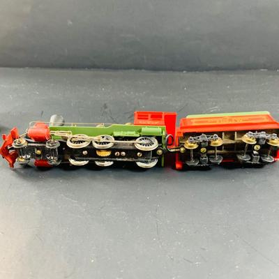 LOT 744: Collection of HO Scale Rail Road Cars and Engines By Tyco and Tempo