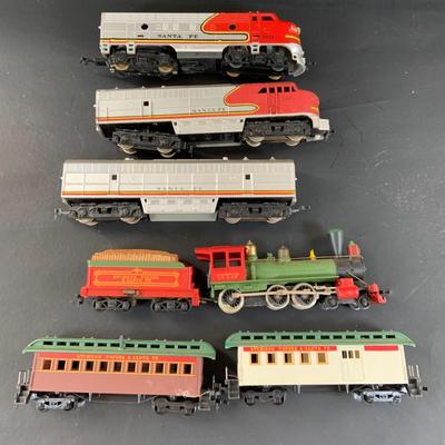 LOT 744: Collection of HO Scale Rail Road Cars and Engines By Tyco and Tempo