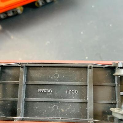 LOT 744: Collection of HO Scale Rail Road Cars and Engines By Tyco and Tempo