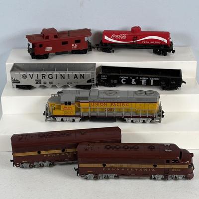 LOT 748: Athearn Genesis HO Union Pacific #2047, Pennsylvania Maroon Locomotive 9506-A and Train Car 9506-B along with Various Train Cars