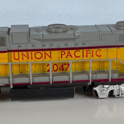 LOT 748: Athearn Genesis HO Union Pacific #2047, Pennsylvania Maroon Locomotive 9506-A and Train Car 9506-B along with Various Train Cars
