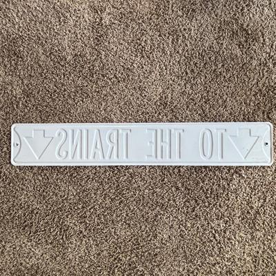 LOT 749: Metal "To The Train" Street Sign