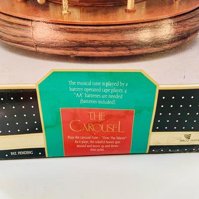 LOT 515: Merry Melody In Motion - The Carousel