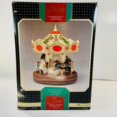LOT 515: Merry Melody In Motion - The Carousel