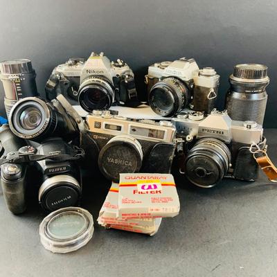 LOT 518: Large Assortment of 35mm Cameras, Lenses and More