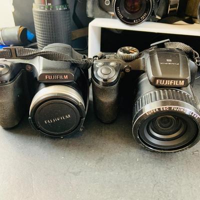 LOT 518: Large Assortment of 35mm Cameras, Lenses and More