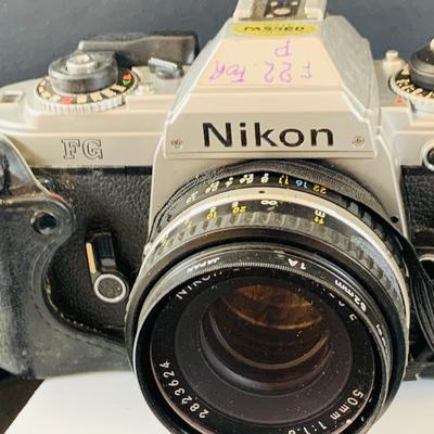 LOT 518: Large Assortment of 35mm Cameras, Lenses and More