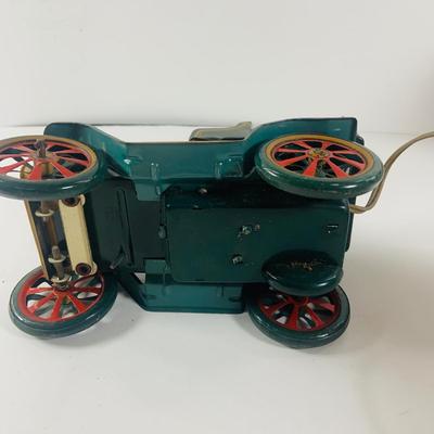 LOT 521:Vintage Collection Tin Toy Cars, Model T Plastic Salt and Pepper Shake Set, Pencil Shapener and Paperweight