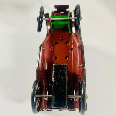 LOT 521:Vintage Collection Tin Toy Cars, Model T Plastic Salt and Pepper Shake Set, Pencil Shapener and Paperweight
