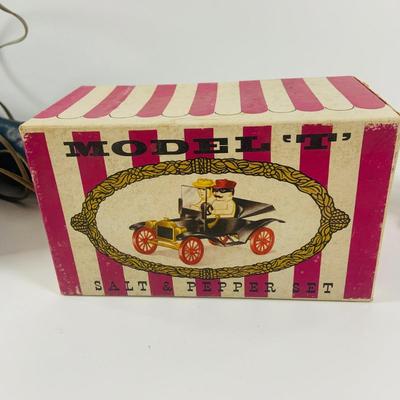 LOT 521:Vintage Collection Tin Toy Cars, Model T Plastic Salt and Pepper Shake Set, Pencil Shapener and Paperweight