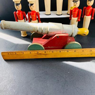 LOT 527: Collection of Vintage Toy Wood Soldiers and Wood Toy Canon and Metal Top