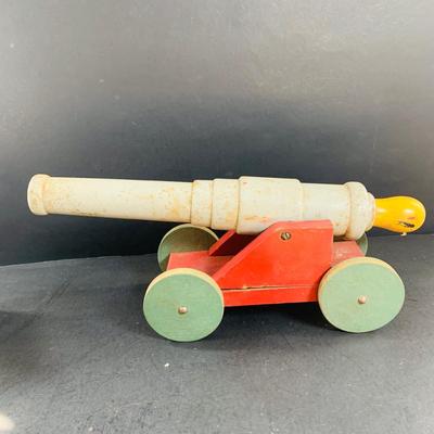LOT 527: Collection of Vintage Toy Wood Soldiers and Wood Toy Canon and Metal Top