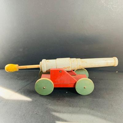LOT 527: Collection of Vintage Toy Wood Soldiers and Wood Toy Canon and Metal Top