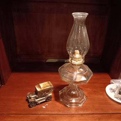 TALL GLASS OIL LAMP AND A METAL CAR BANK WITH THE KEY
