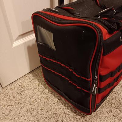 SNAP-ON TOOL BAG ON WHEELS WITH A PULL HANDLE
