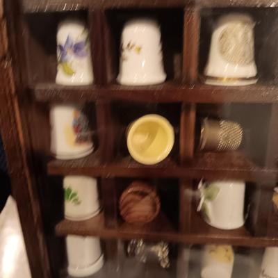 DISPLAY CASE FULL OF SEWING THIMBLES