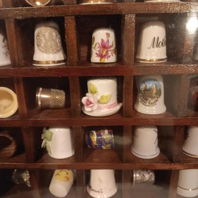 DISPLAY CASE FULL OF SEWING THIMBLES
