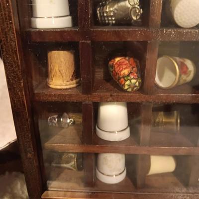 DISPLAY CASE FULL OF SEWING THIMBLES