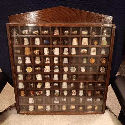 DISPLAY CASE FULL OF SEWING THIMBLES