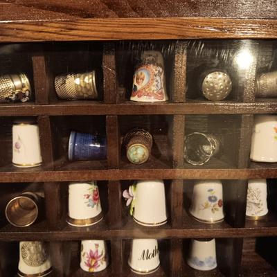 DISPLAY CASE FULL OF SEWING THIMBLES