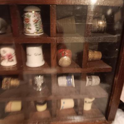 DISPLAY CASE FULL OF SEWING THIMBLES