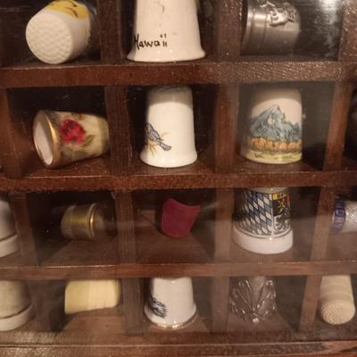 DISPLAY CASE FULL OF SEWING THIMBLES