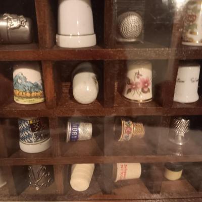 DISPLAY CASE FULL OF SEWING THIMBLES