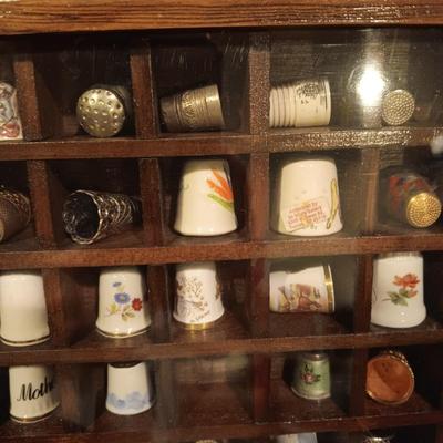 DISPLAY CASE FULL OF SEWING THIMBLES