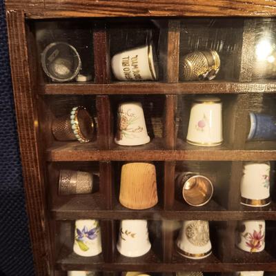 DISPLAY CASE FULL OF SEWING THIMBLES