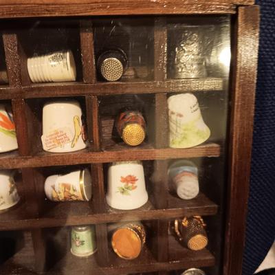 DISPLAY CASE FULL OF SEWING THIMBLES