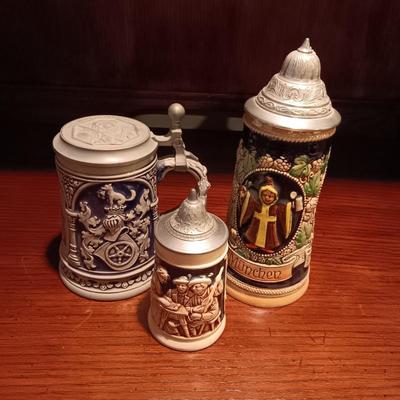 3 GERMAN STEINS WITH PEWTER TOPS