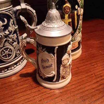3 GERMAN STEINS WITH PEWTER TOPS