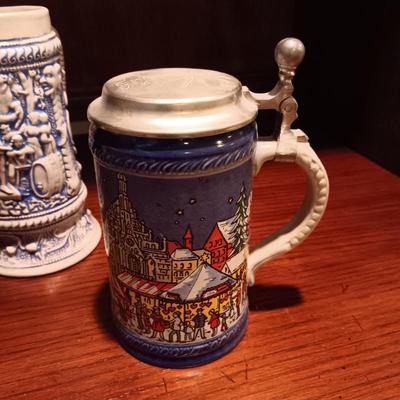 3 GERMAN STEINS AND A BEER MUG