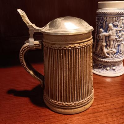 3 GERMAN STEINS AND A BEER MUG