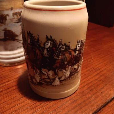 A VARIETY OF STEINS AND BEER MUGS