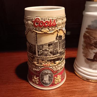 A VARIETY OF STEINS AND BEER MUGS