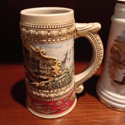A VARIETY OF STEINS AND BEER MUGS