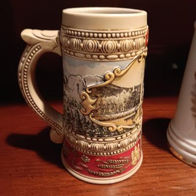 A VARIETY OF STEINS AND BEER MUGS