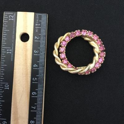 Vintage gold toned , twisted robe double circle, pink rhinestone brooch