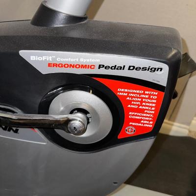 SCHWINN ERGONOMIC STATIONARY EXERCISE BIKE PLUS HAND WEIGHTS AND BALL
