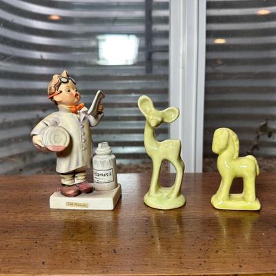 GOEBEL HUMMEL "LITTLE PHARMACIST" AND WALKER POTTERY FIGURINES